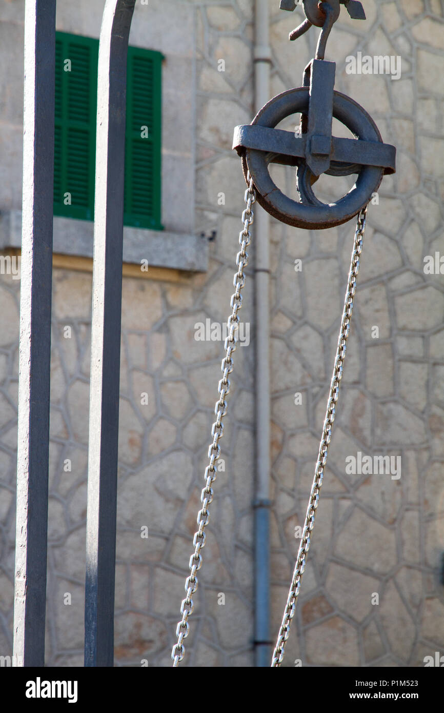Ancient pulley from well Stock Photo Alamy