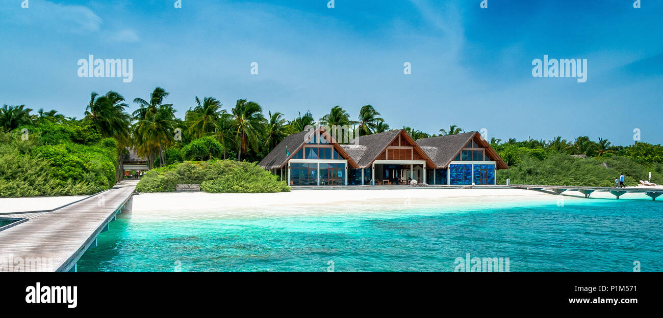 Maldives sailing beautiful beach background white sandy tropical paradise island with blue sky sea water ocean Stock Photo