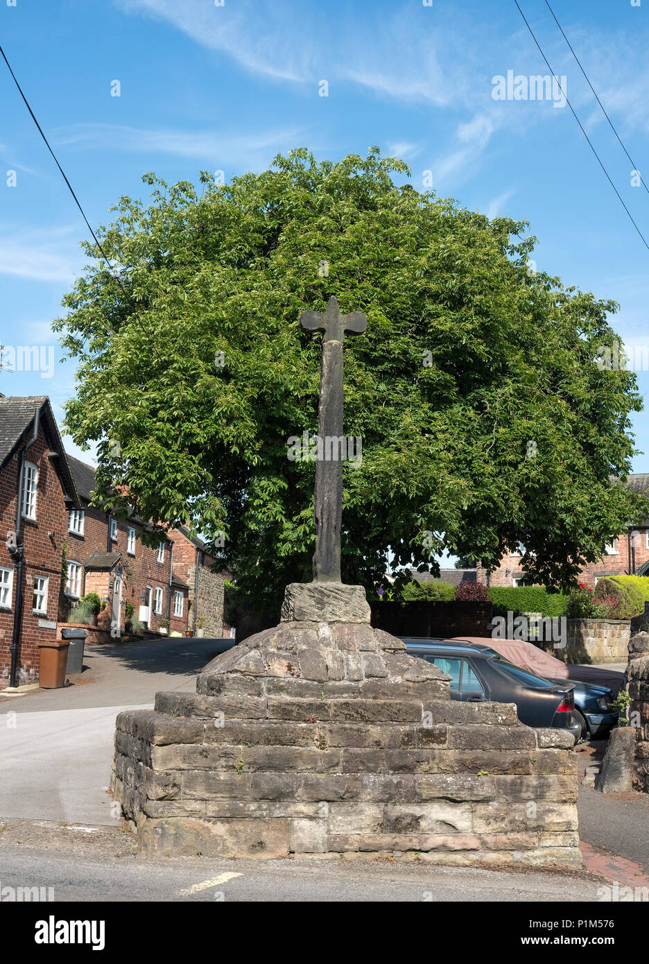 An ancient stone cross in Stanton by Dale, Derbyshire, UK Stock Photo