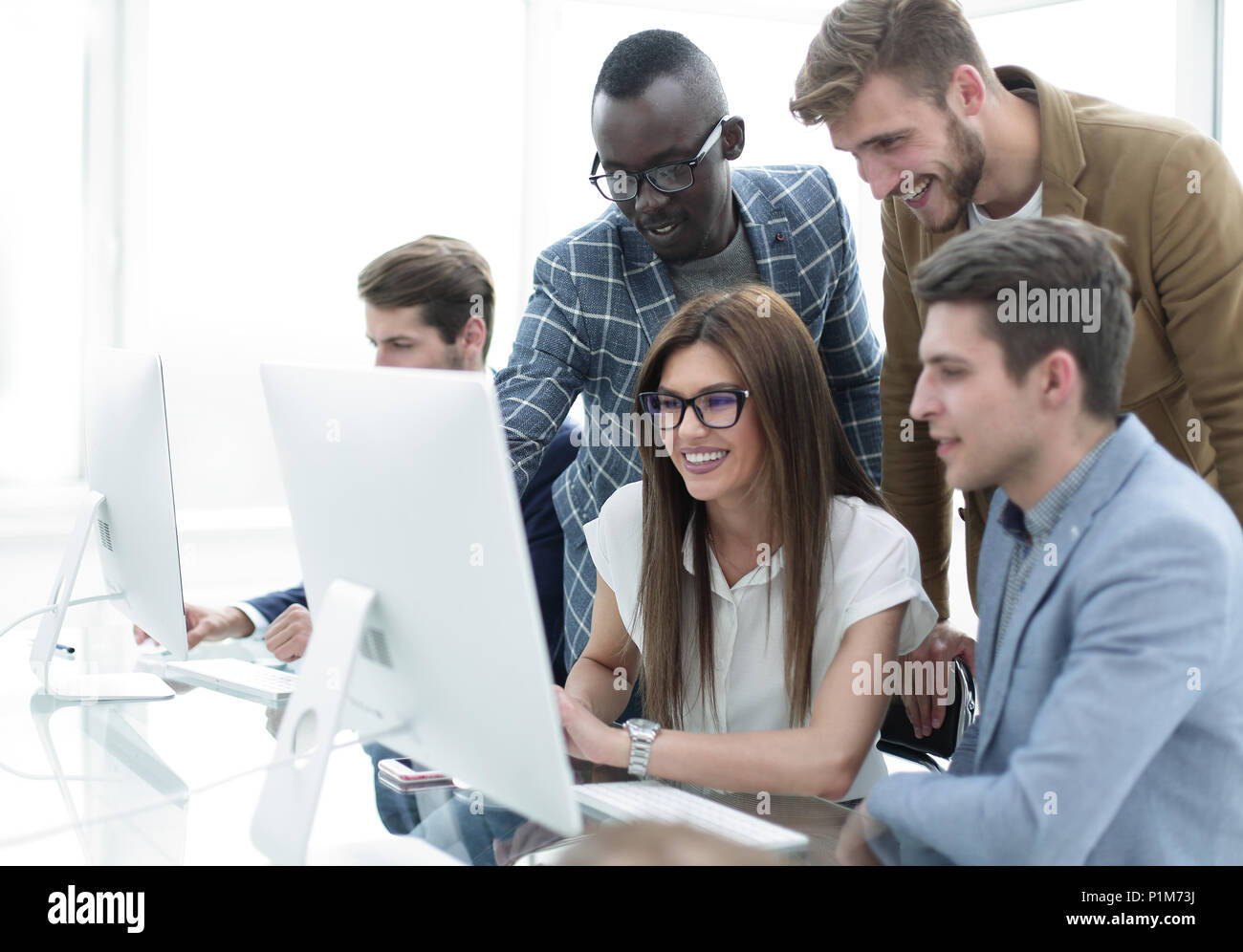Company employees working in software development and designer office Stock Photo