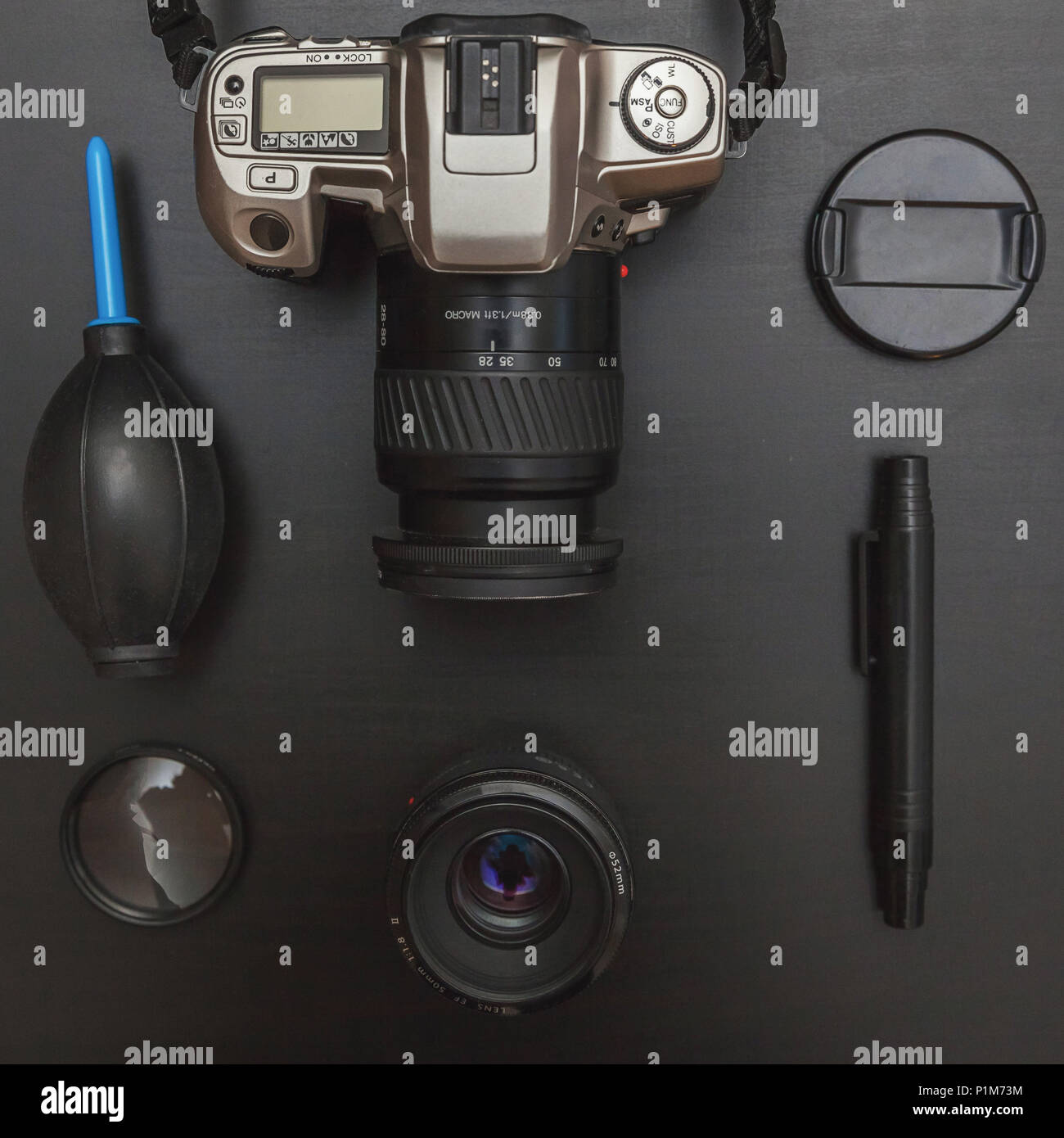 Top view of work space photographer with dslr camera system, camera  cleaning kit, lens and camera accessory on black table background. Hobby  journalis Stock Photo - Alamy