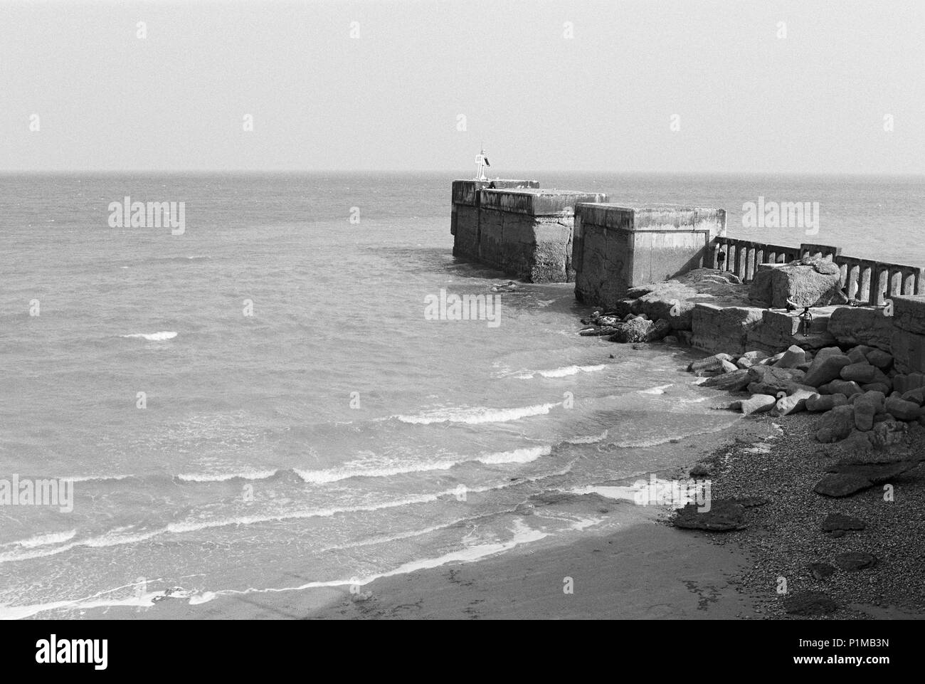 The disused harbour arm at Hastings, East Sussex, on the South Coast Stock Photo