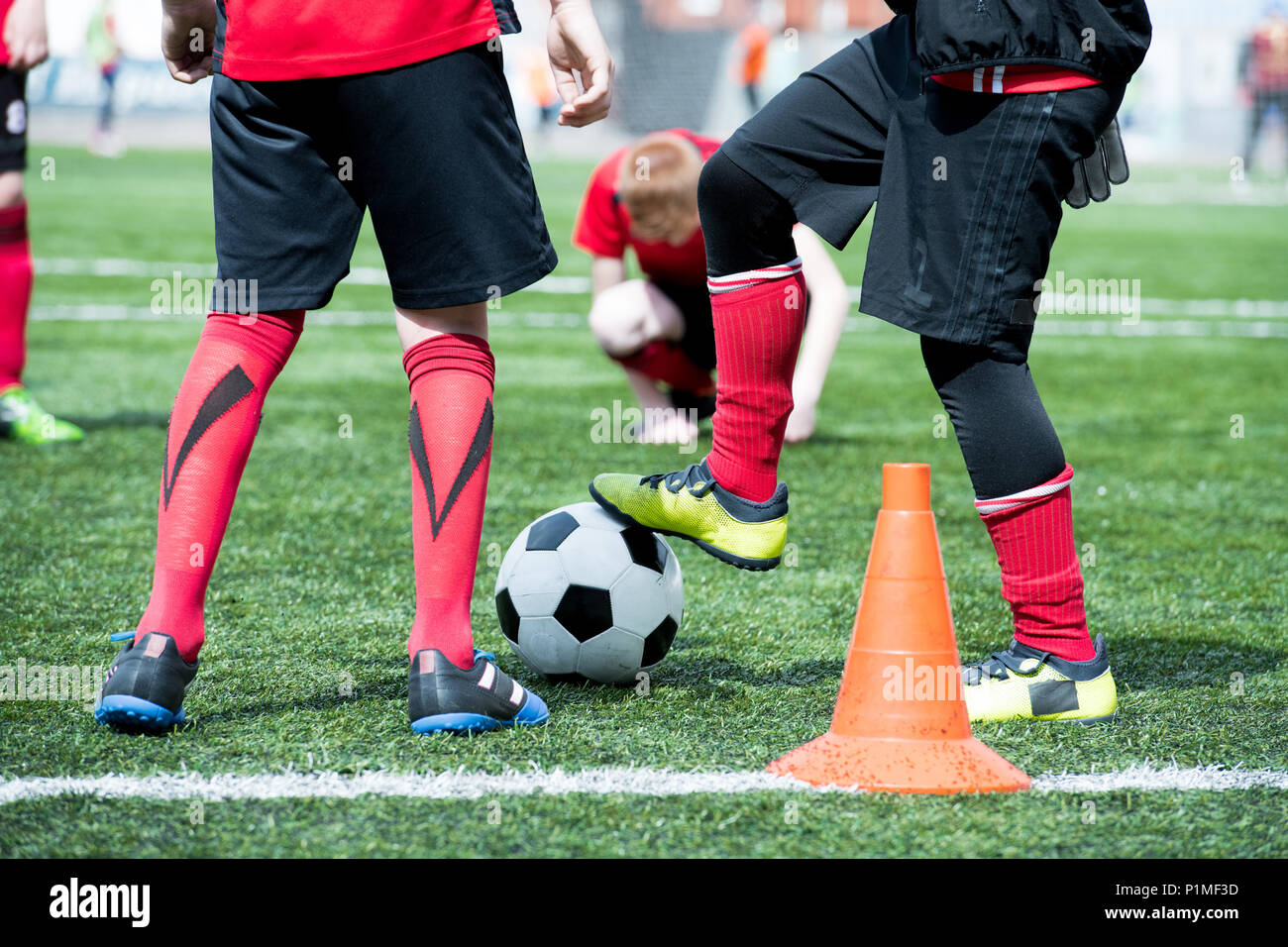 Junior Football Team with Ball Stock Photo Alamy
