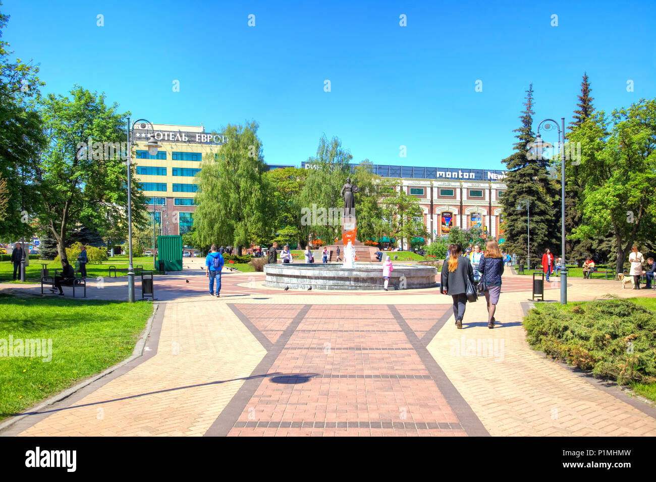 KALININGRAD, RUSSIA - May 04.2018: A cozy square with a fountain and sculpture Motherland - Mother in the center of the city Stock Photo