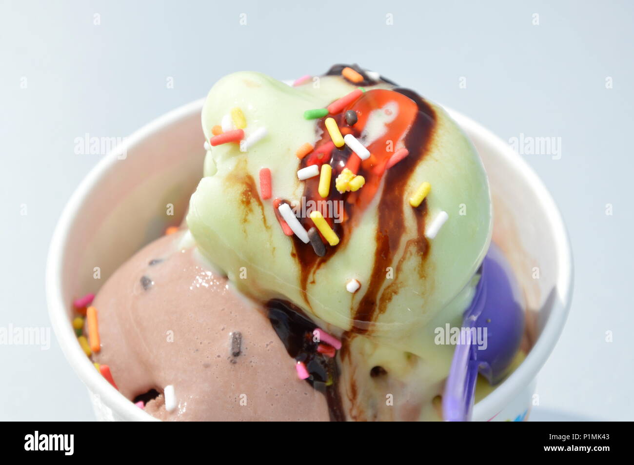 melt ice cream in paper cup Stock Photo - Alamy