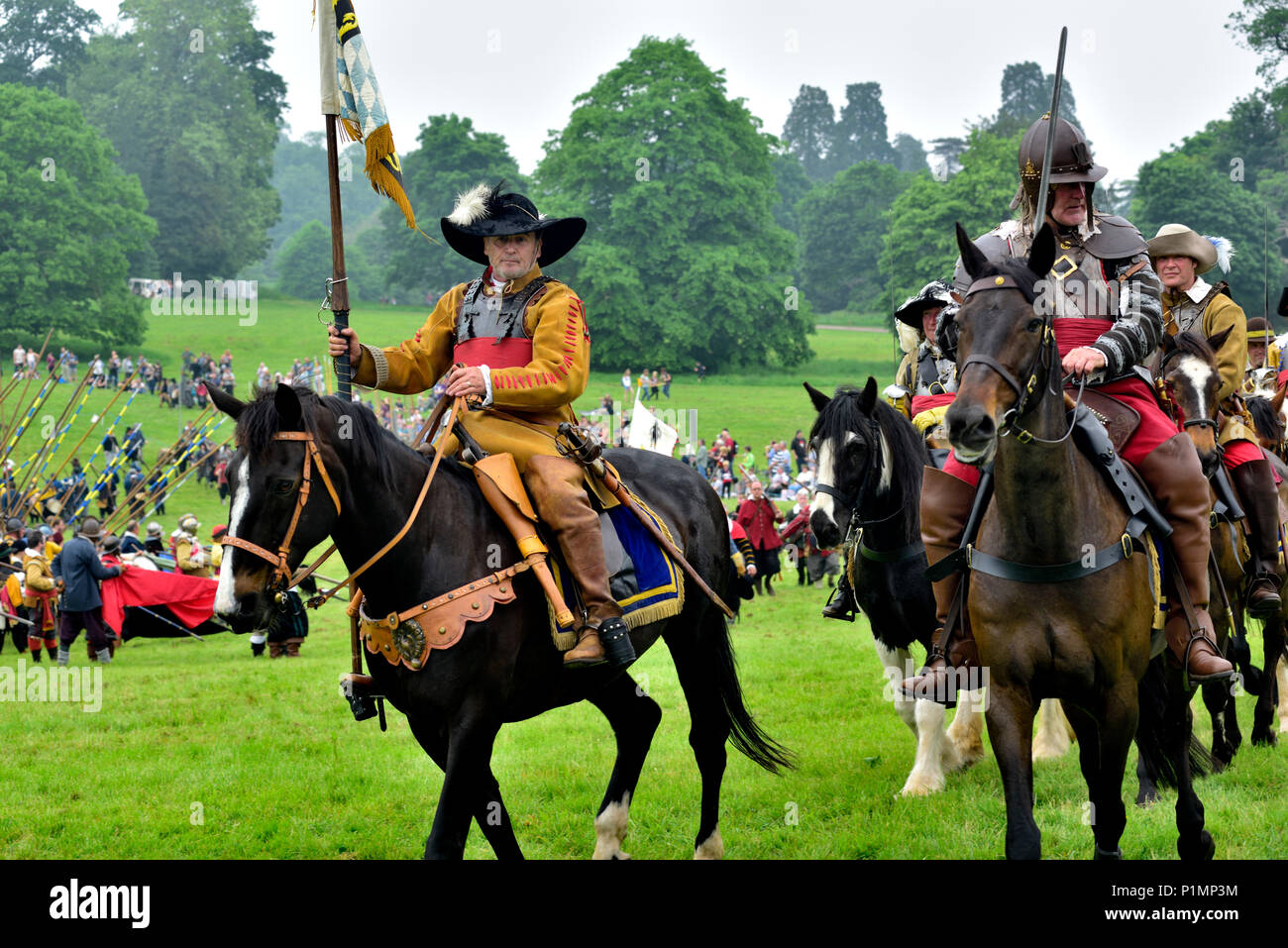 Royalist cavalry solder in armour on horseback 17th century military reenactment, English Civil war, UK Stock Photo
