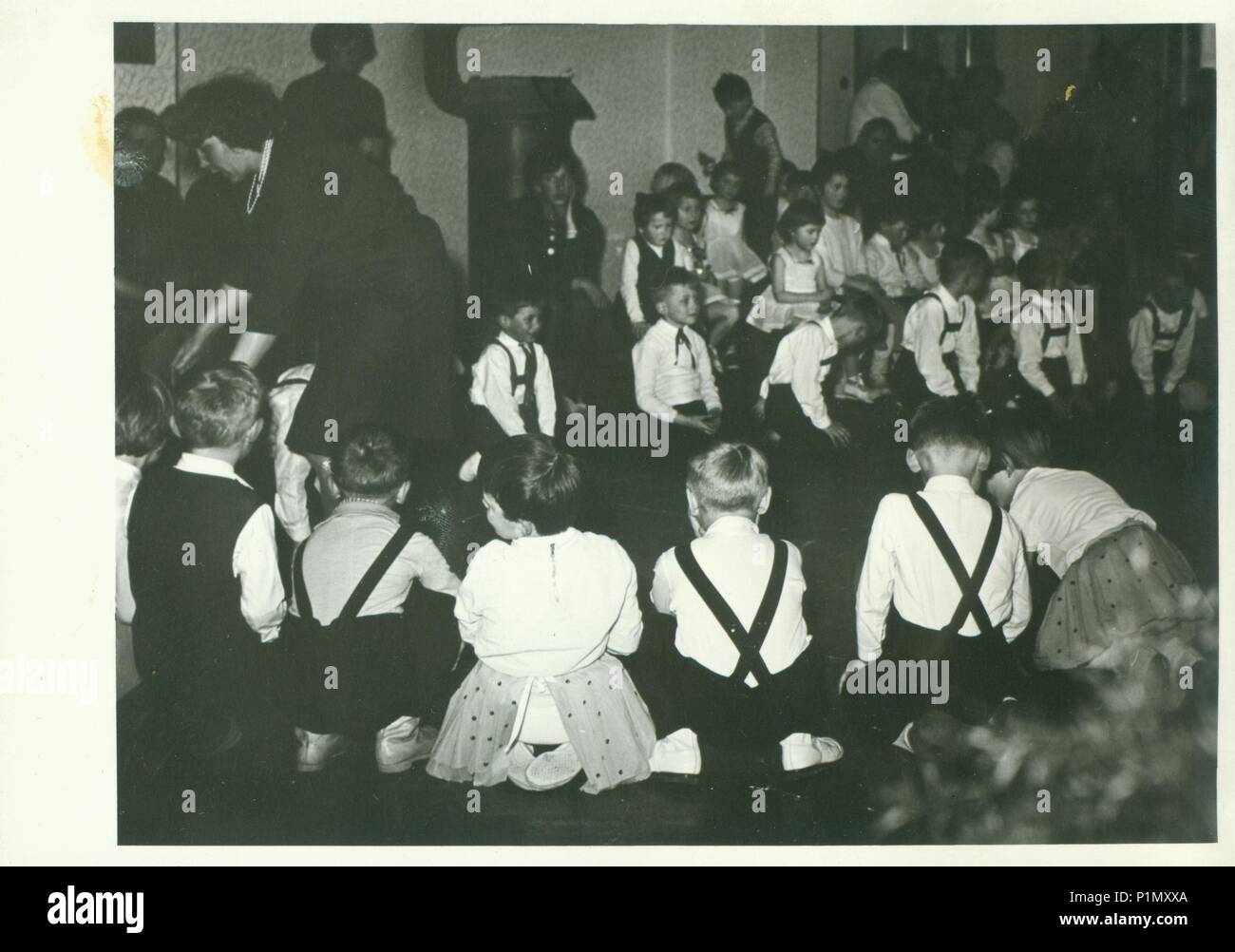 THE CZECHOSLOVAK SOCIALIST REPUBLIC - CIRCA 1960s: Retro photo shows small pupils in the classroom.  Vintage black & white photography. Stock Photo