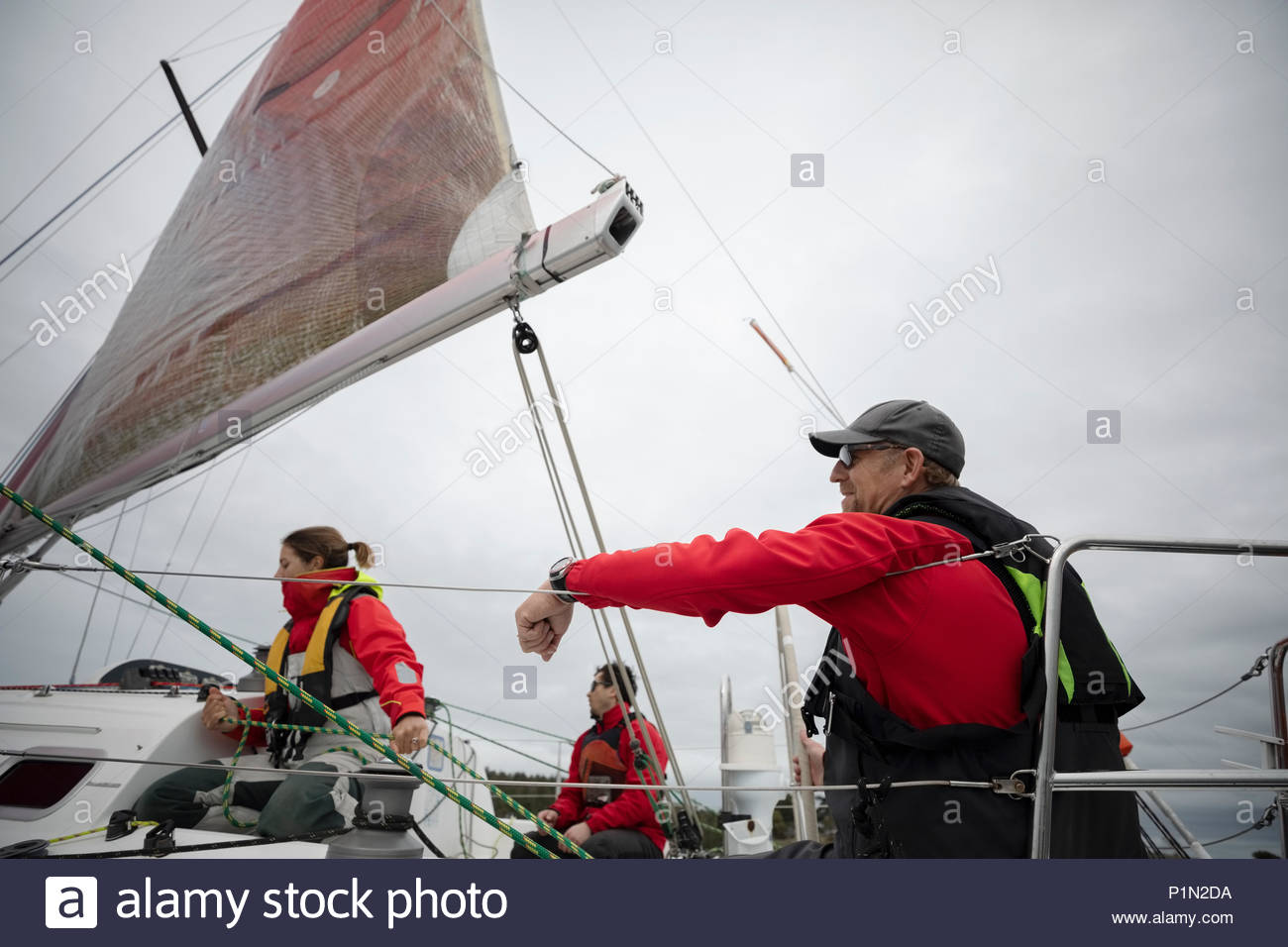 Sailing team training on sailboat Stock Photo Alamy