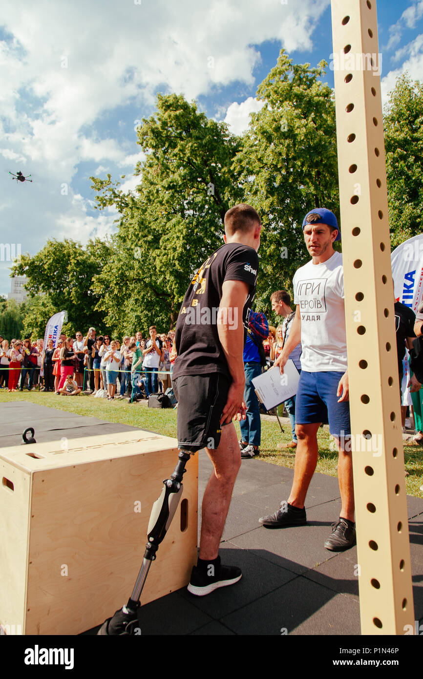 under the brand name 'games for heroes' - the stage of the sports crossfit of all Ukrainian competitions for veterans of the war in Kharkov on June 9, Stock Photo