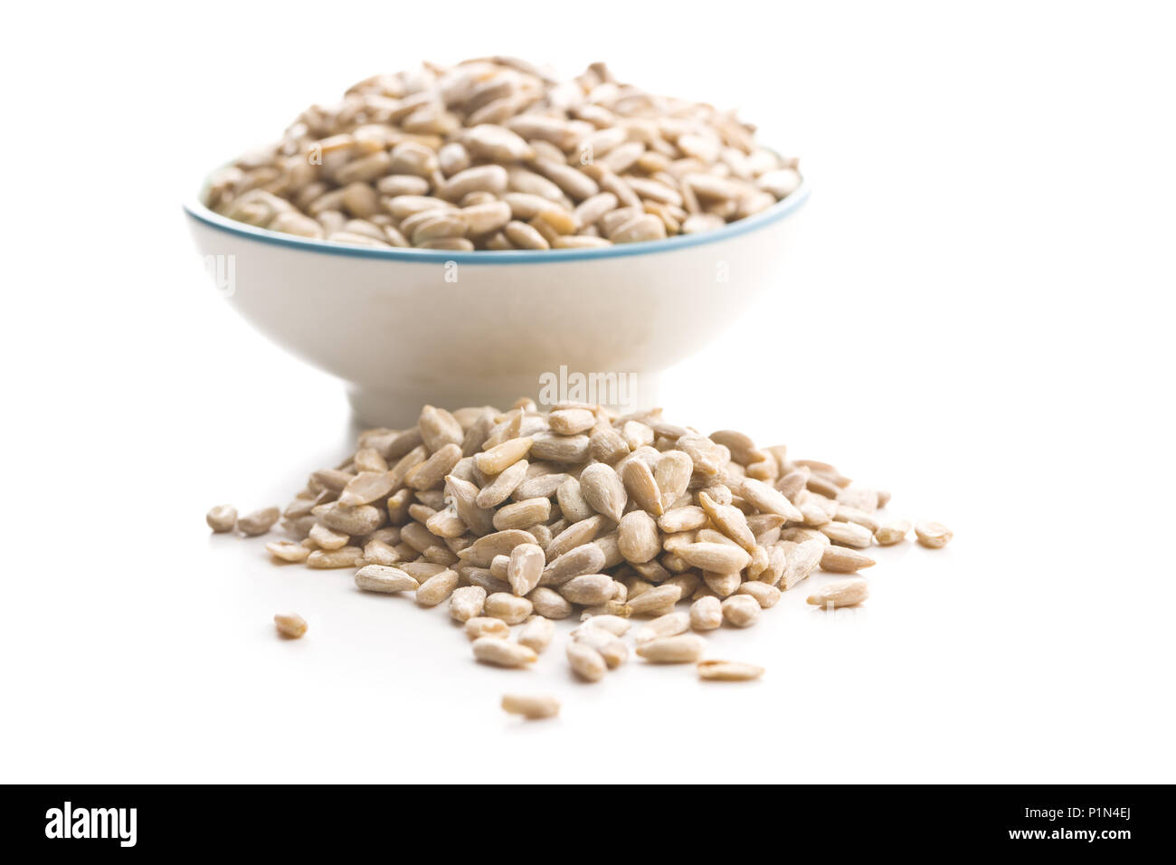 Peeled sunflower seeds isolated on white background Stock Photo - Alamy