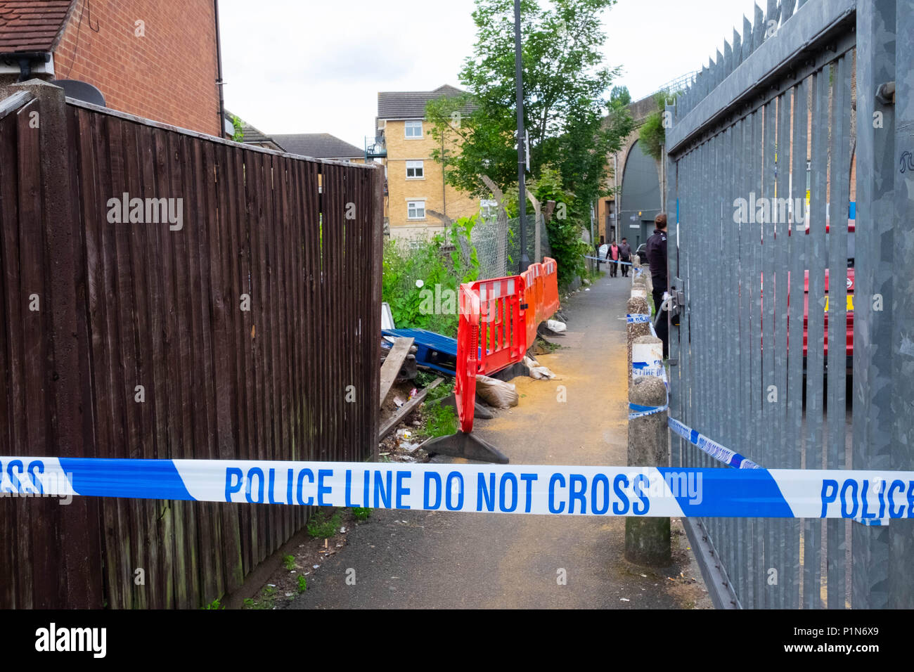 South Harrow, London, England. 12th June 2018. Police search for clues
