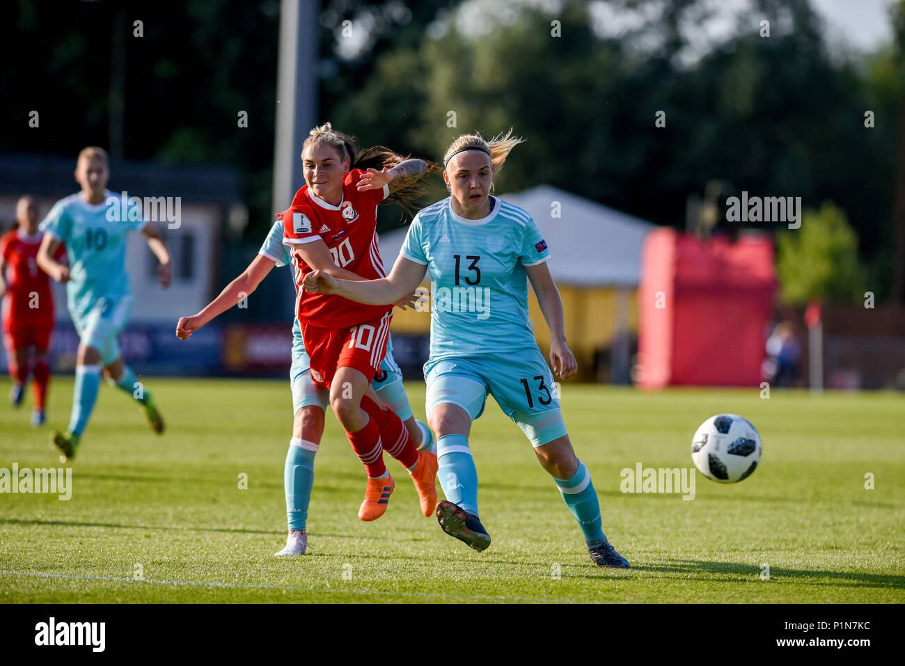 Newport, Wales. 12th June 2018. Wales v Russia, World Cup Qualifier 2019, Newport Stadium, Newport, Wales, 12/6/18: Jess Fishlock of Wales competes for the ball with Russia's Anna Belomyttseva Credit: Andrew Dowling/Influential Photography/Alamy Live News Stock Photo