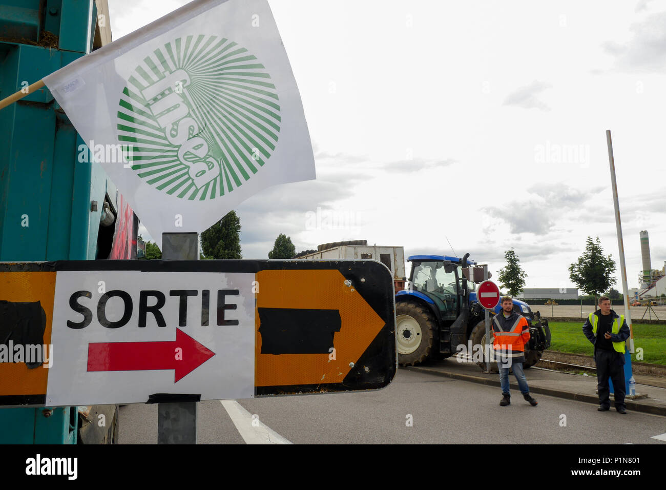 Lyon, France, 12th June 2018: Farmers, members of FNSEA and Jeunes Agriculteurs (in english, Young Farmers) are seen in Lyon (Central-Eastern France) as they take part, for the second day, in the blockade of the fuel tanks at Edouard Herriot industrial harbor, to protest against both the revision of European financial aid and  the massive importation of palm oil by Total petroleum company. This action was part of a national movement of blockade concerning different refineries and fuel depots for a three days long period. Credit photo : Serge Mouraret/Alamy Live News Stock Photo