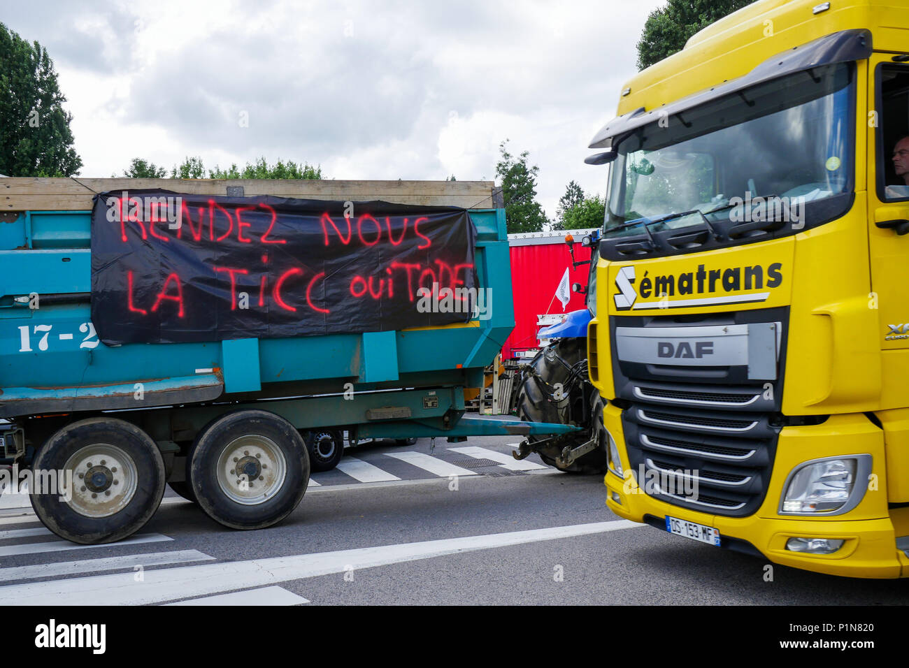 Lyon, France, 12th June 2018: Farmers, members of FNSEA and Jeunes Agriculteurs (in english, Young Farmers) are seen in Lyon (Central-Eastern France) as they take part, for the second day, in the blockade of the fuel tanks at Edouard Herriot industrial harbor, to protest against both the revision of European financial aid and  the massive importation of palm oil by Total petroleum company. This action was part of a national movement of blockade concerning different refineries and fuel depots for a three days long period. Credit photo : Serge Mouraret/Alamy Live News Stock Photo