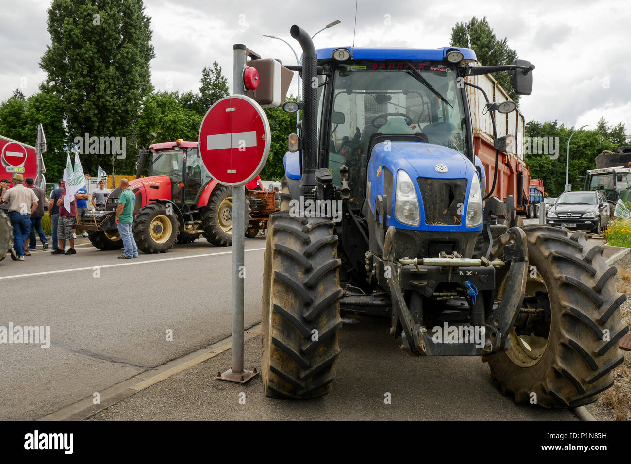 Lyon, France, 12th June 2018: Farmers, members of FNSEA and Jeunes Agriculteurs (in english, Young Farmers) are seen in Lyon (Central-Eastern France) as they take part, for the second day, in the blockade of the fuel tanks at Edouard Herriot industrial harbor, to protest against both the revision of European financial aid and  the massive importation of palm oil by Total petroleum company. This action was part of a national movement of blockade concerning different refineries and fuel depots for a three days long period. Credit photo : Serge Mouraret/Alamy Live News Stock Photo