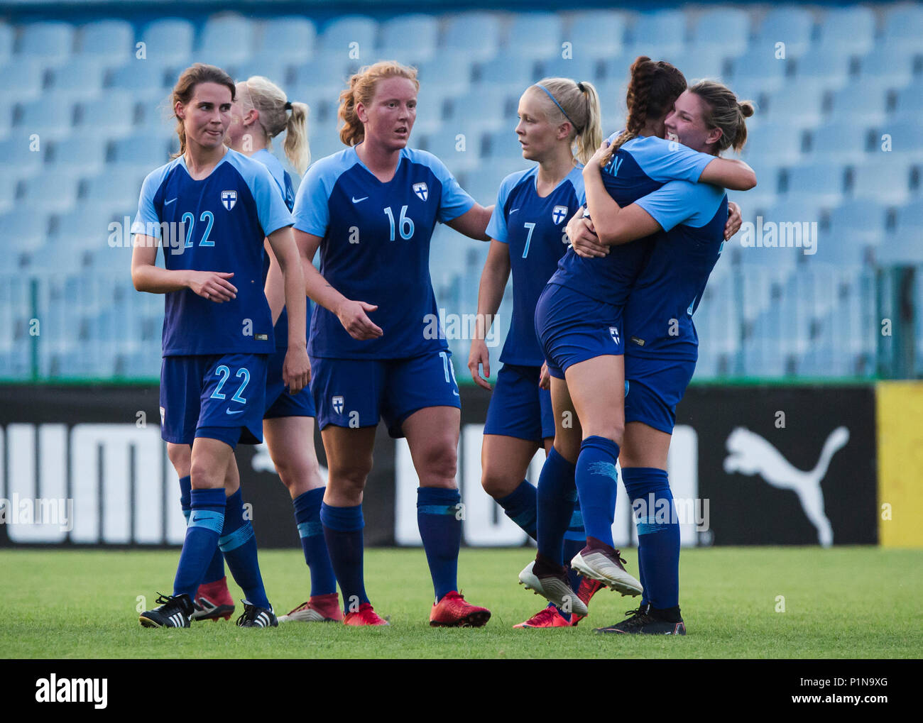 Belgrade, Serbia. 12th June 2018. Defender Tiia Peltonen of Finland, Defender Anna Westerlund of Finland, Forward Adelina Engman of Finland celebrate the victory with their team mate Credit: Nikola Krstic/Alamy Live News Stock Photo