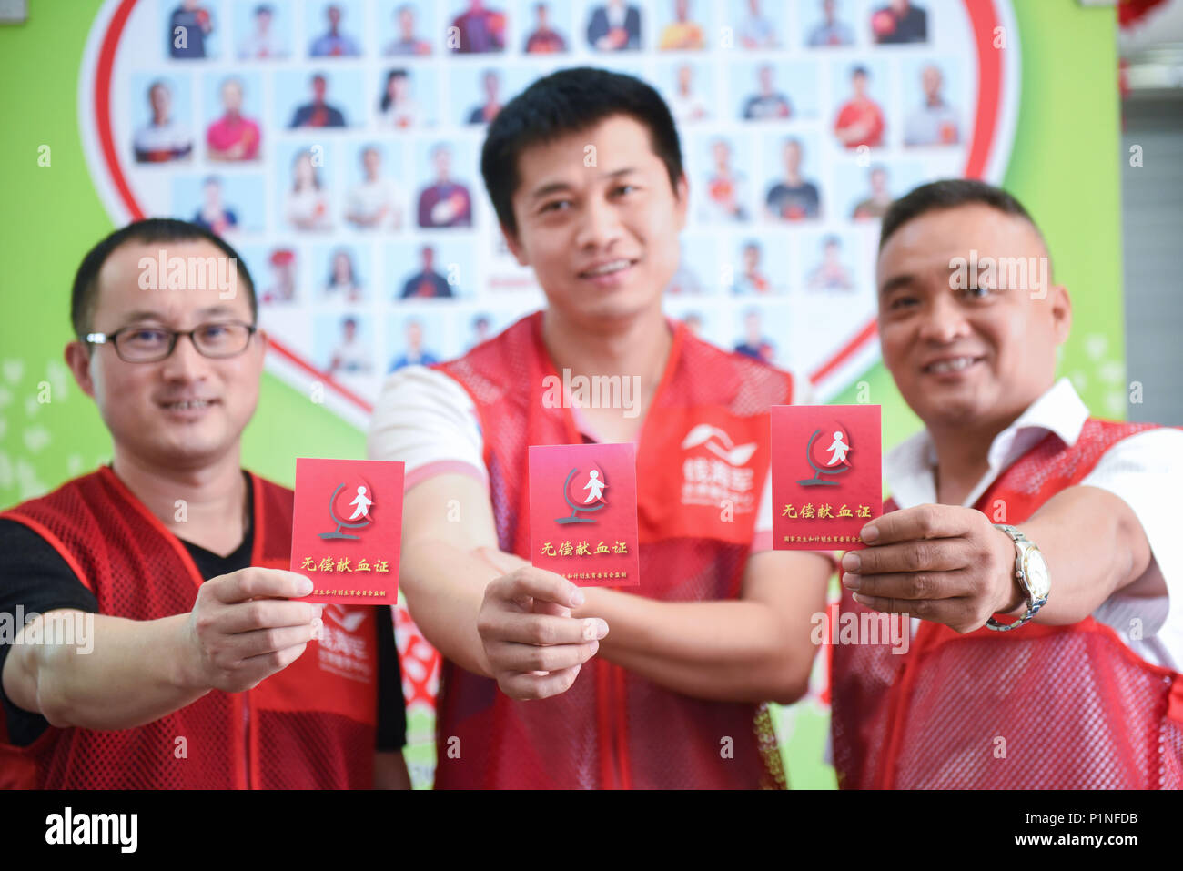Cixi 13th June 2018 Volunteers Display Certificates After Donating Blood At A Blood Donation Center In Cixi City East China S Zhejiang Province June 13 2018 One Day Ahead Of The World Blood