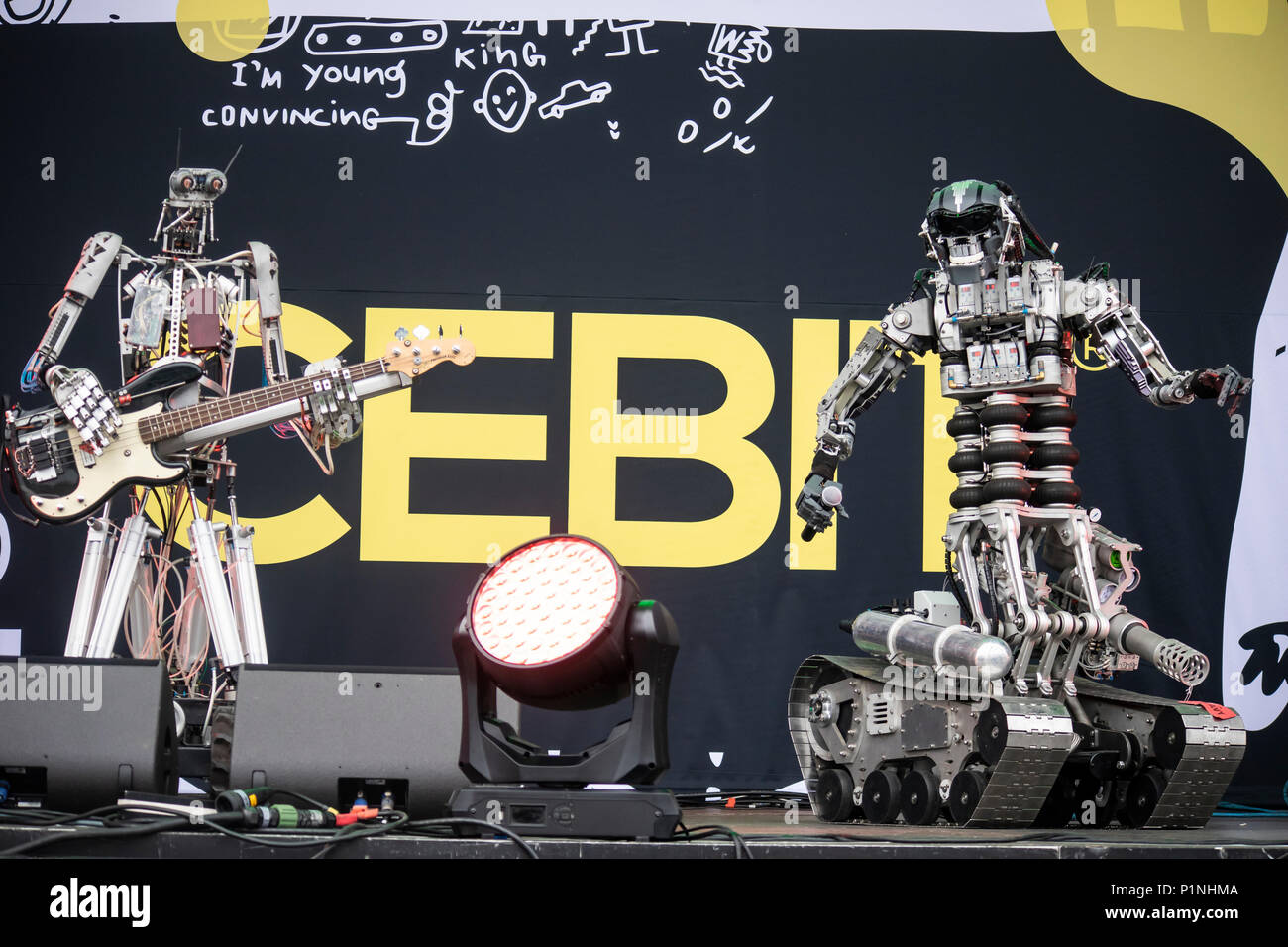 Hannover, Germany. 12th June, 2018. Robot band Compressorhead (here robots  Bones and Mega-Wattson) - based in Berlin and playing on real musical  instruments - is performing live at CEBIT 2018, international computer