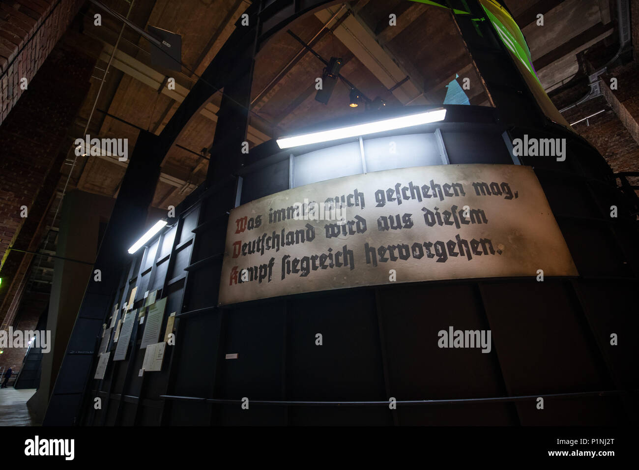 13 June 2018, Nuremberg, Germany: View of the exhibition 'Hitler.Macht.Oper · Propaganda und Musiktheater in Nürnberg' (lit. 'Propaganda and Musical Theatre in Nuremberg') at the Documentation Center Nazi Party Rally Grounds. The exhibition will be shown between the 15th of June 2018 and the 3rd of February 2019. It documents the role of musical theatre in National Socialist propaganda. Photo: Daniel Karmann/dpa Stock Photo