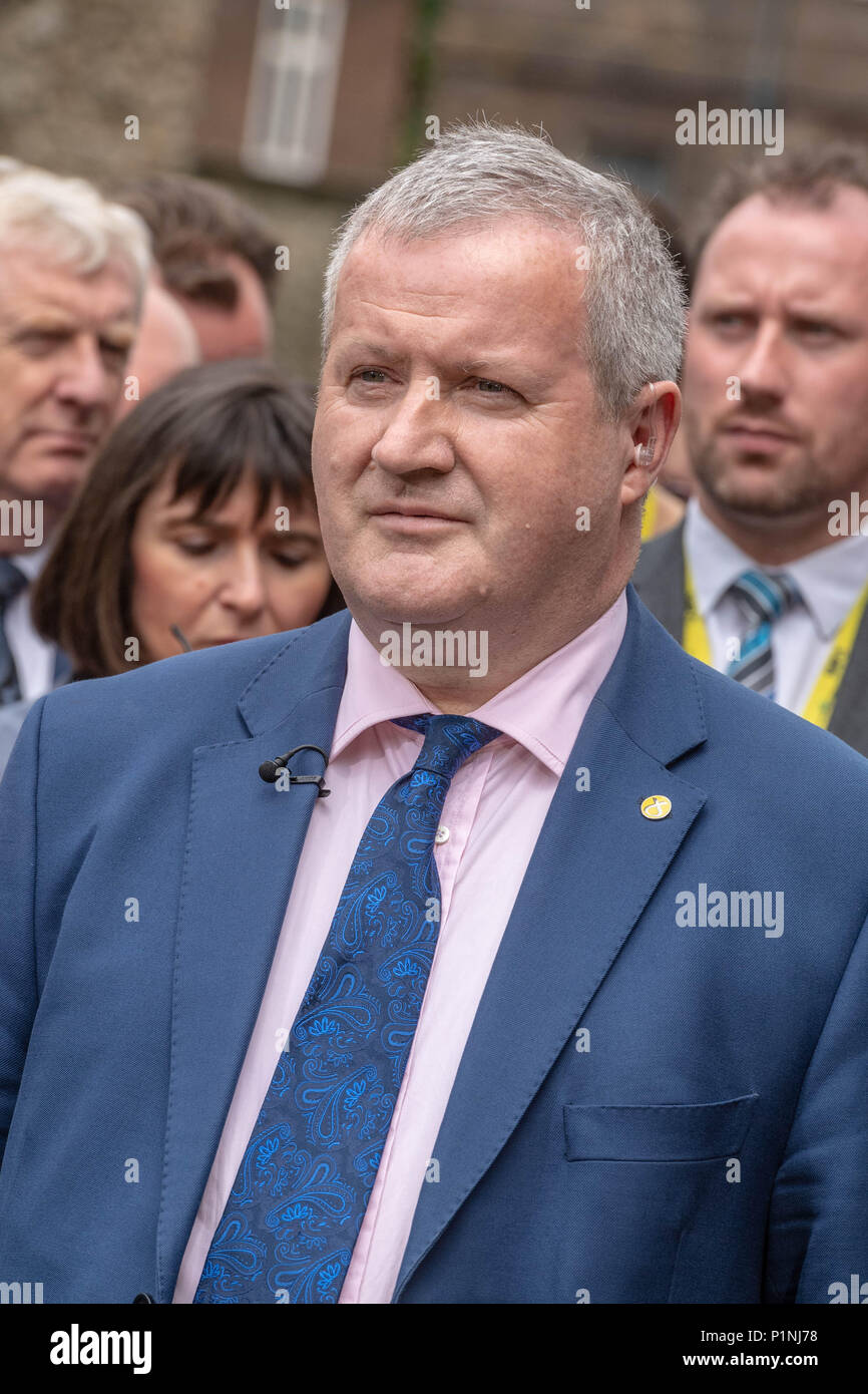 London, UK. 13th June 2018 Ian Blackford MP Leader of the SNP at Westminster, talks to the media after all the SNP MP's walk out of the Commons following his expulsion from the Commons by the Speaker John Bercow for heckling over the lack of  voice for the SNP during the BREXIT debate Credit Ian Davidson/Alamy Live News Stock Photo