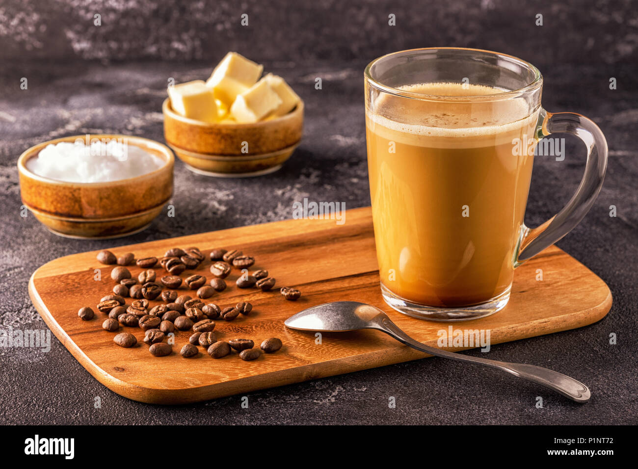 Bulletproof coffee, blended with organic  butter and MCT coconut oil, paleo, keto, ketogenic drink breakfast. Stock Photo