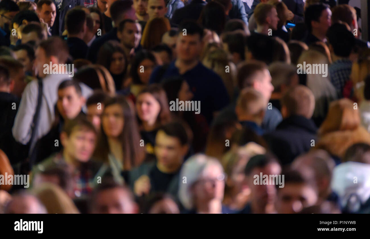 Crowd of walking people walking indoors. Stock Photo