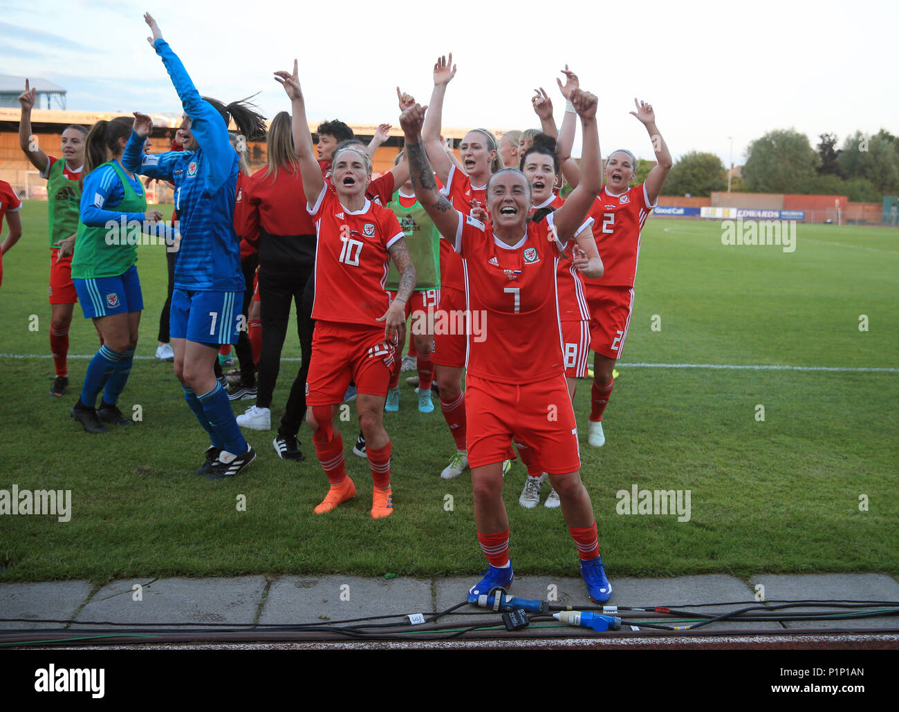 Wales Women players celebrate victory after the FIFA Women's World Cup Qualifying Group One match at Newport Stadium, Newport. Stock Photo