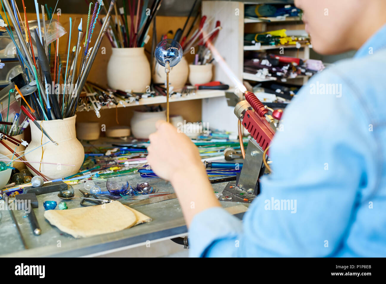 Woman making glass bead hi res stock photography and images Alamy Woman making glass bead hi res stock photography and images Alamy