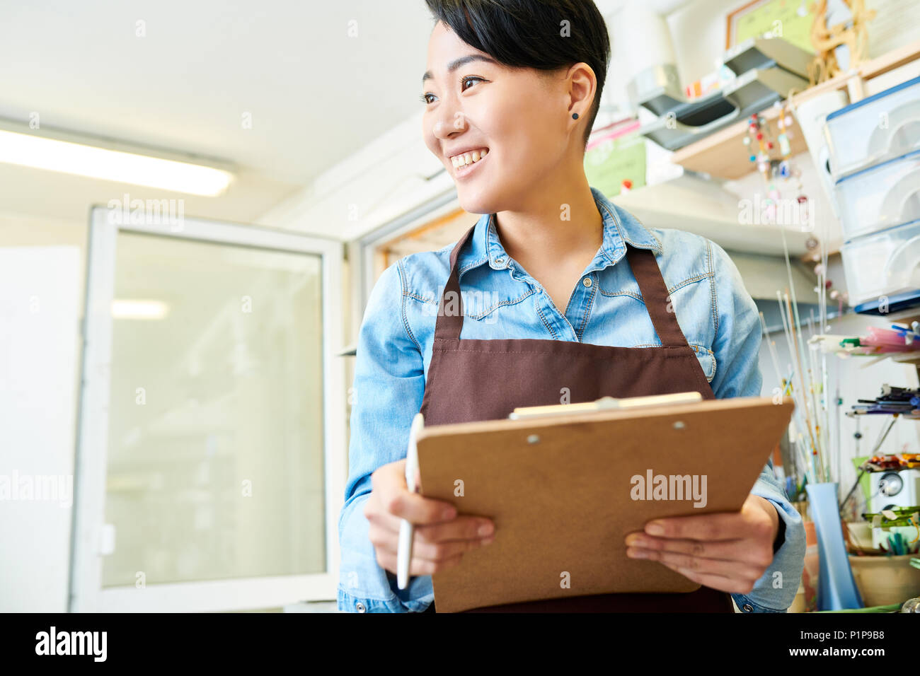 Asian  Female Artists in Workshop Stock Photo