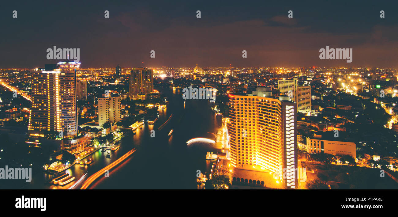 Modern city at night, Thailand Stock Photo