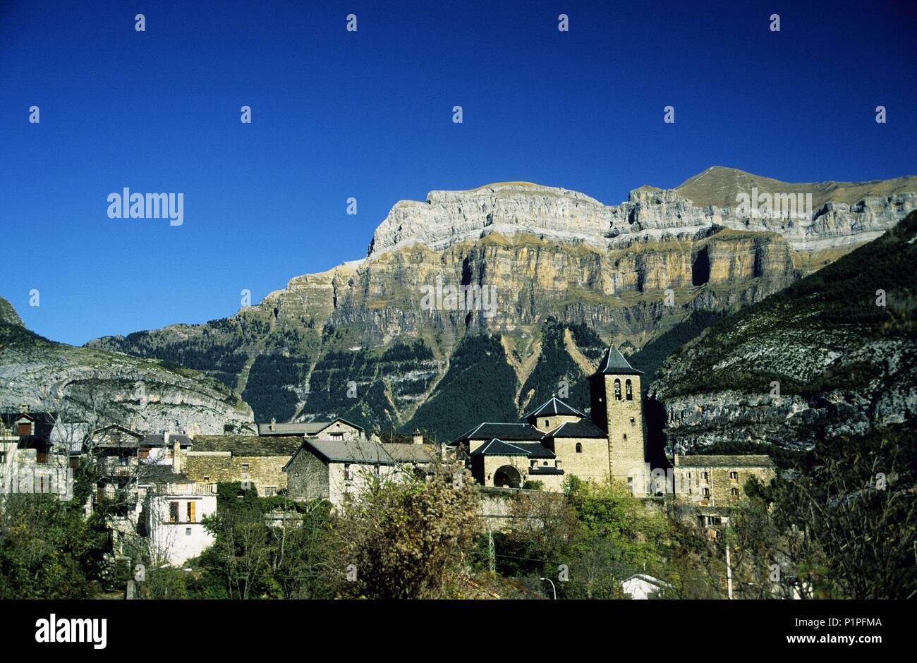 Torla, village and valley and Parque Nacional de / Ordesa y Monte Perdido National Park at the background (Pyrenees). Stock Photo