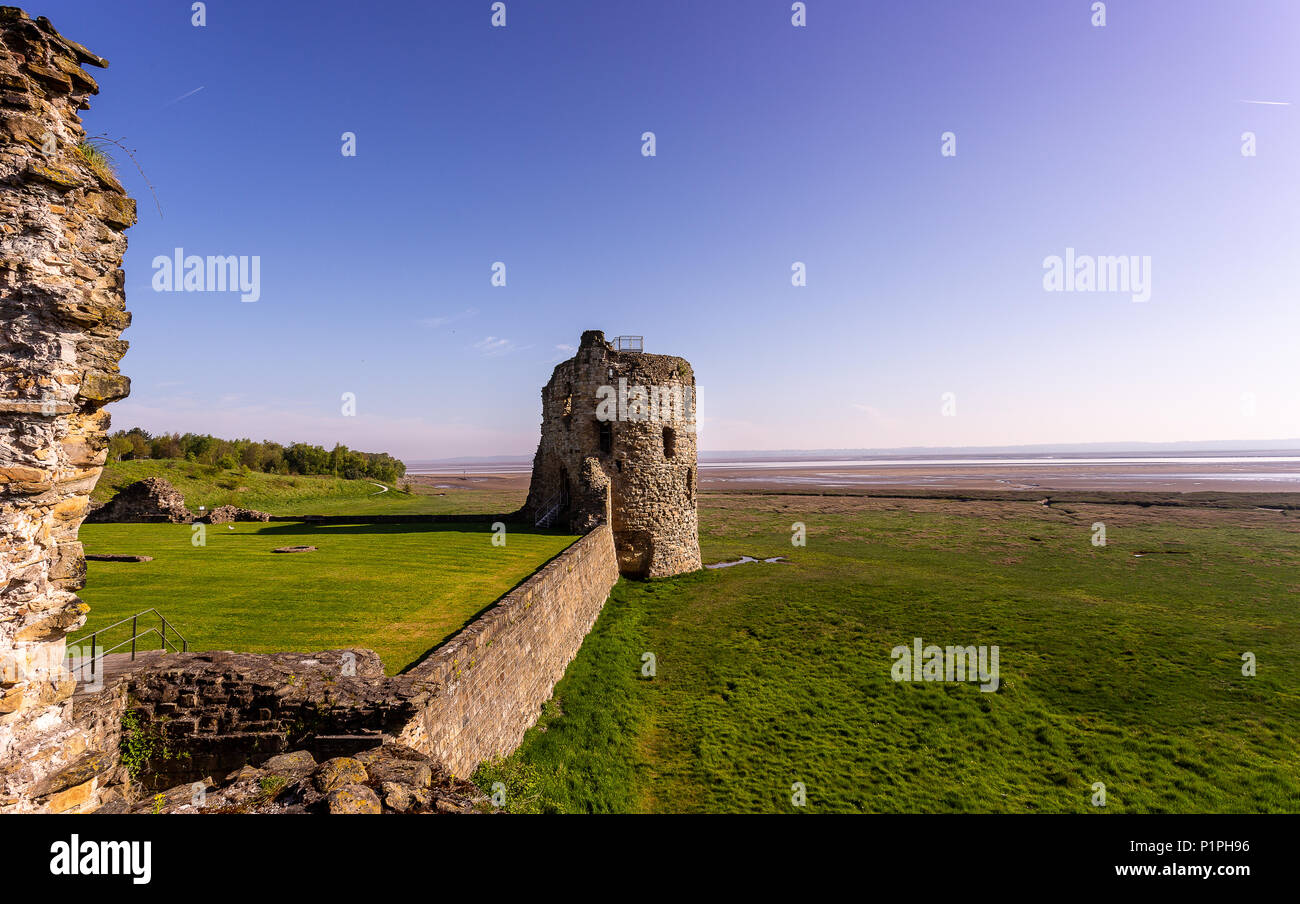 Ruins of Flint castle situated near the seaside in Wales, the United Kingdom on early spring morning Stock Photo