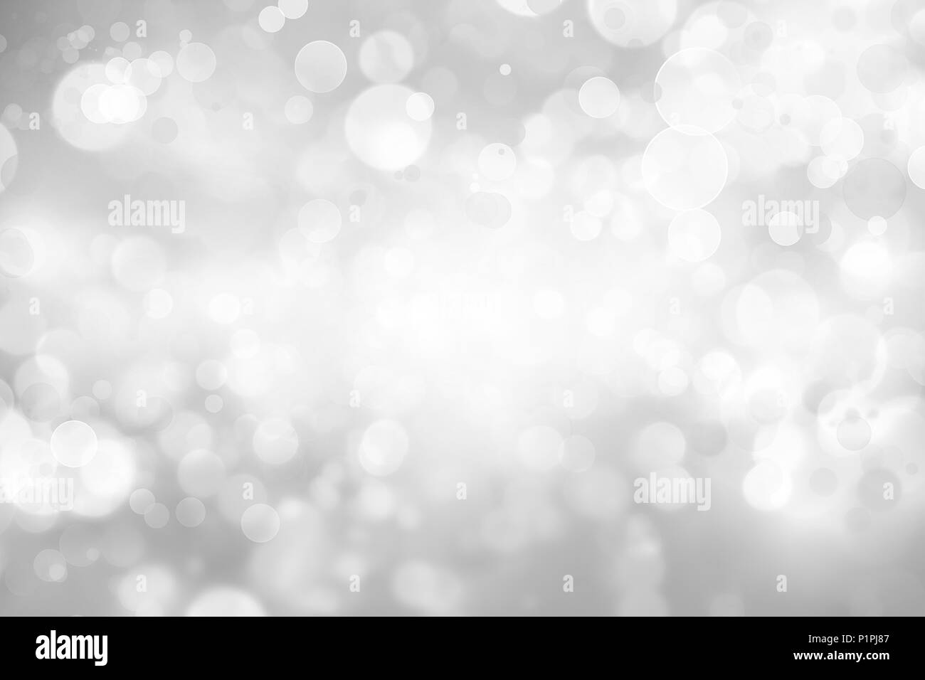Gray and white circles abstract defocused bokeh background Stock Photo