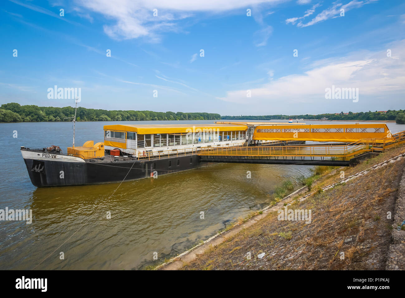 VUKOVAR, CROATIA - MAY 14, 2018 : View of a tourist ship moored on the coast of the river Danube in Vukovar, Croatia. Stock Photo