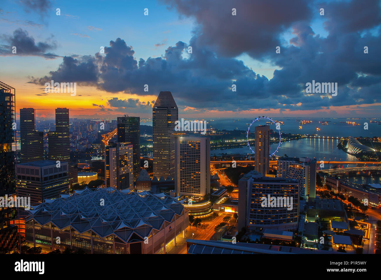 Aerial view of sunrise at Marina Bay Singapore city skyline Stock Photo ...