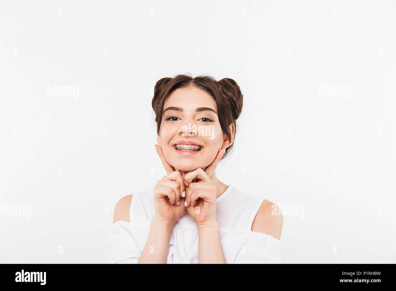Portrait Closeup Of Joyful Smiling Girl 20s With Double Buns