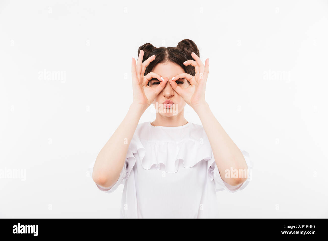 Photo Of Playful Cheerful Girl 20s With Two Buns Hairstyle