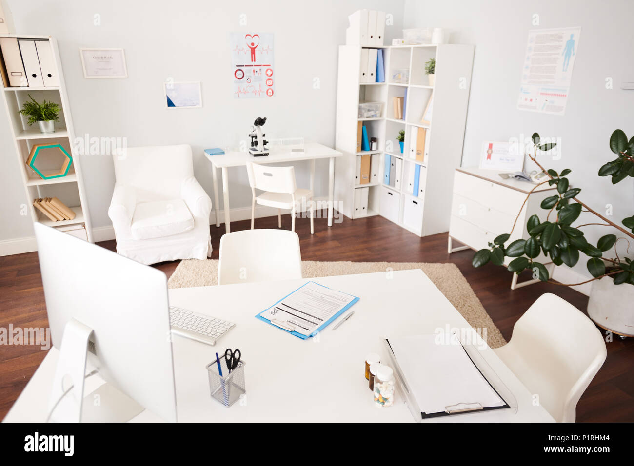Interior of Empty Doctors Office in Modern Clinic Stock Photo