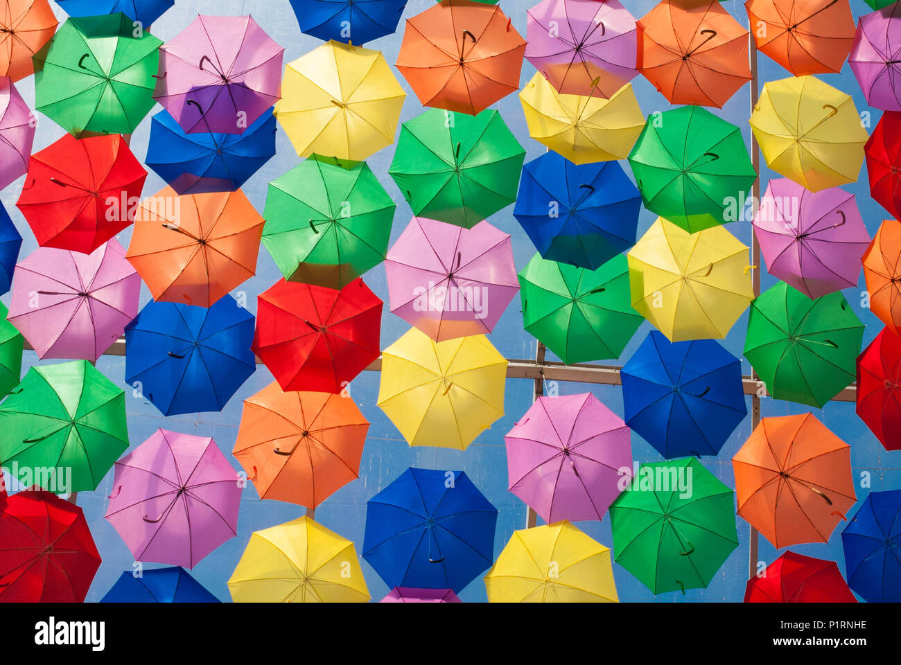 Colourful umbrellas in the street Stock Photo