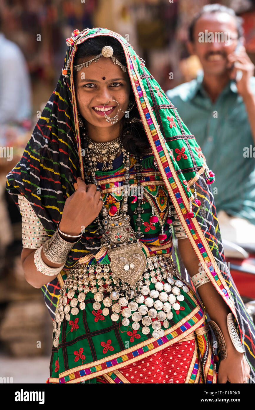 Portrait of a Hindu Indian woman in colourful traditional clothing and accessories, Jaisalmer Fort; Jaisalmer, Rajasthan, India Stock Photo