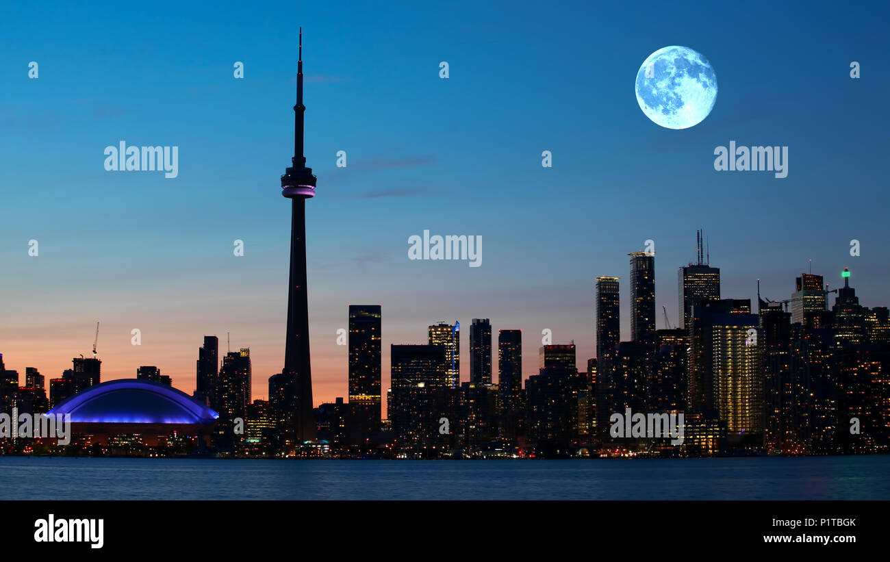 A Full moon rising over Toronto in Canada Stock Photo Alamy
