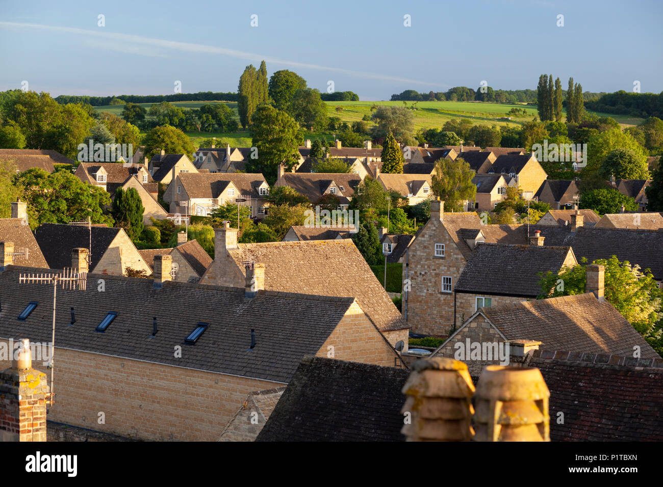 View over houses bordered by green fields, Chipping Campden, Cotswolds, Gloucestershire, England, United Kingdom, Europe Stock Photo