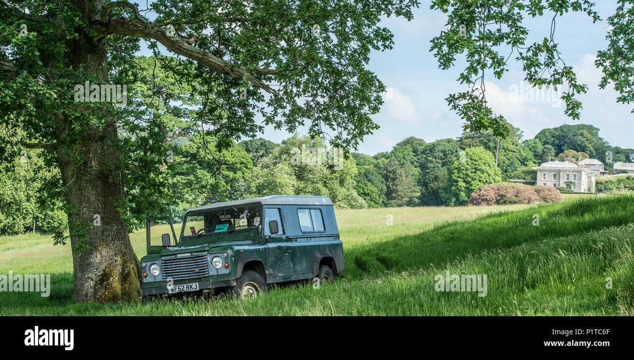 landrover parked in grounds of country house Boconnoc Stock Photo