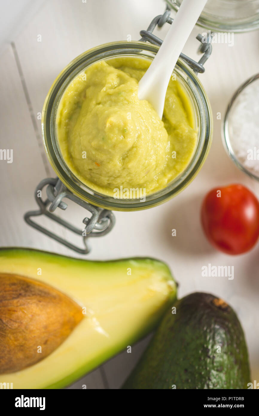 Homemade Green Avocado Spread in Jar. Vegan Raw and Healthy Fresh Food ...
