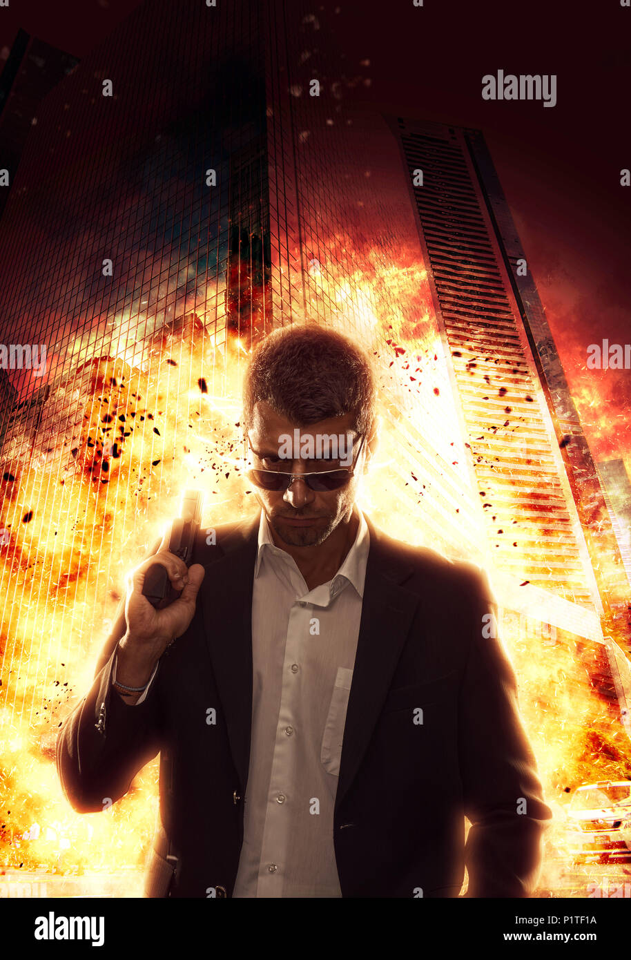 Man in suit with a gun on explosion city  background Stock Photo