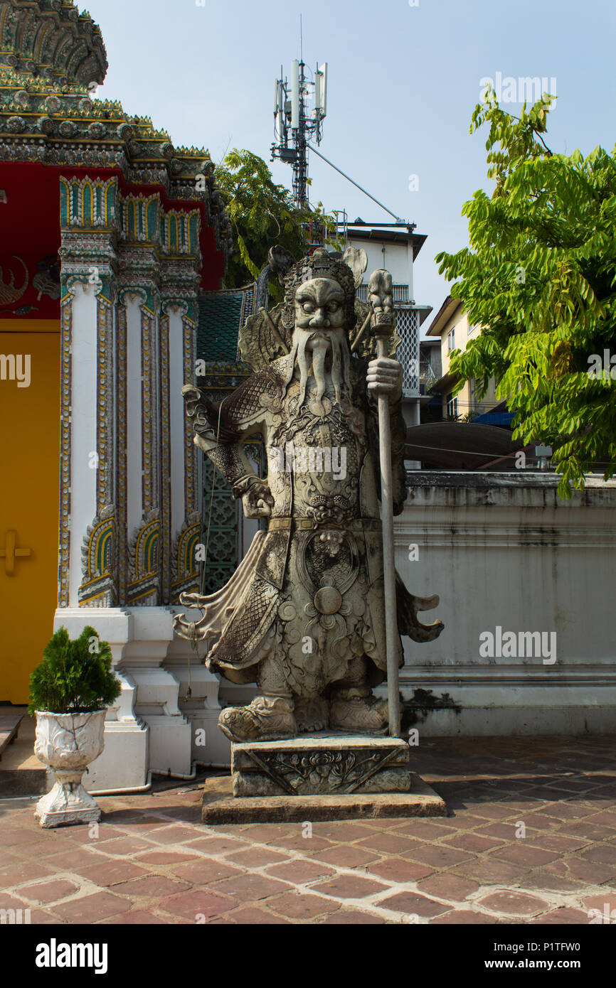Bangkok, Thailand - January 2014: Chinese guardian stone statue in Wat Pho Temple in Bangkok Thailand Stock Photo