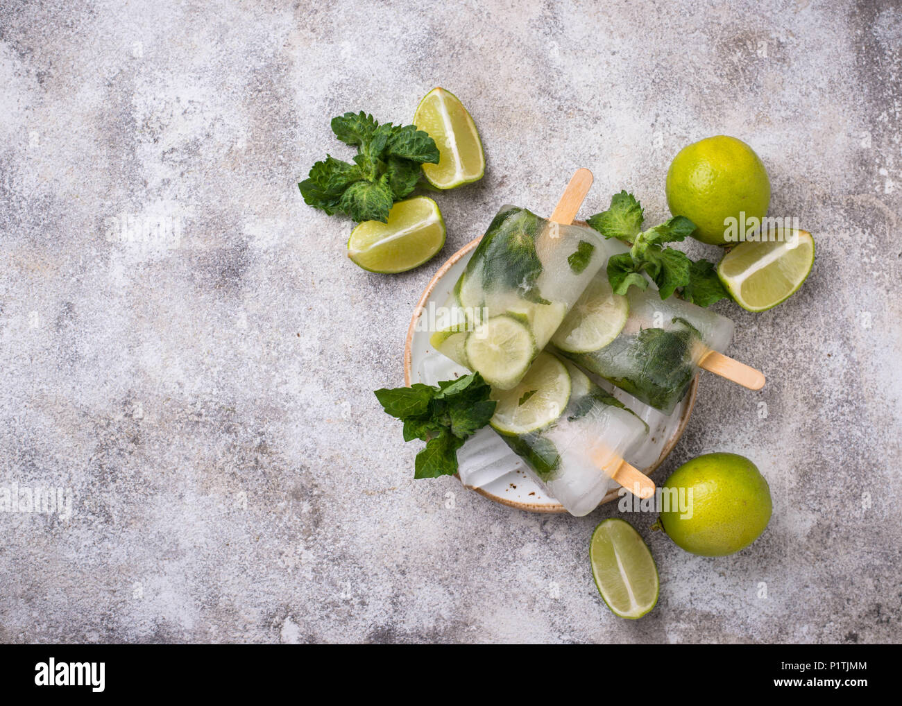 Mojito cocktail popsicle with mint, lime and rum  Stock Photo
