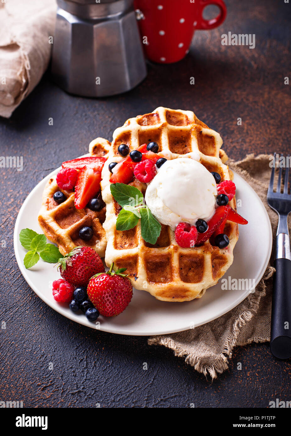 Belgium waffles with berries and ice cream Stock Photo - Alamy