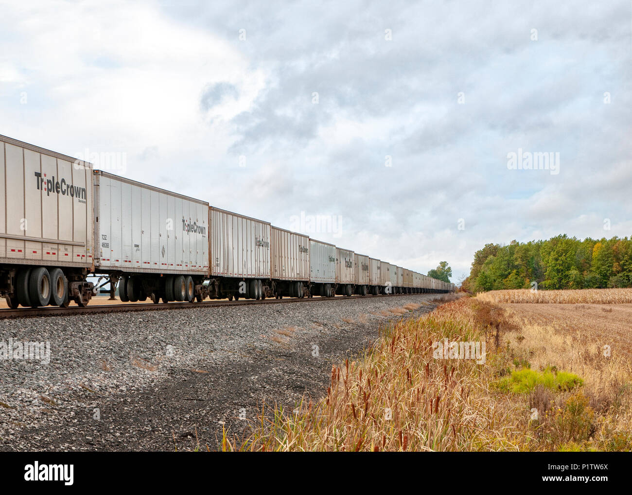 railroad freight cars with Triple Crown on the side of the cars. Northwest Ohio Stock Photo