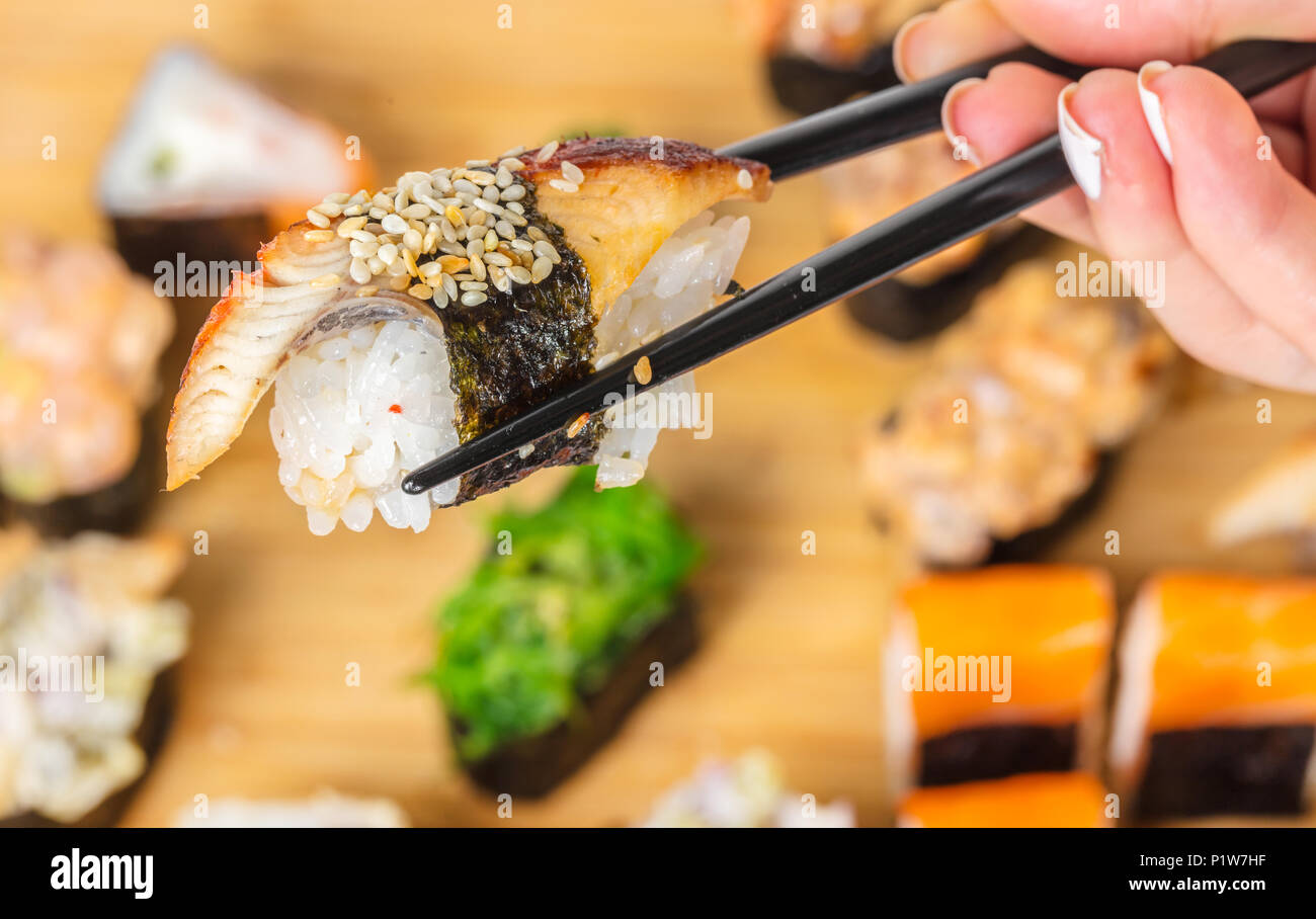 Japanese food, sticks keep sushi with eel Stock Photo